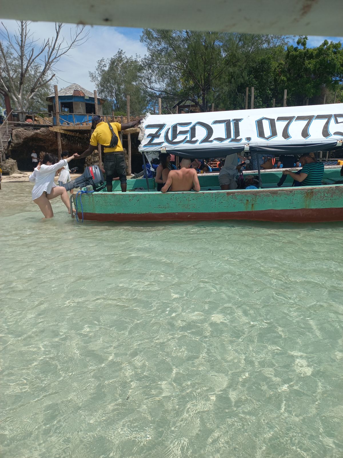 Guests boarding a boat in Zanzibar